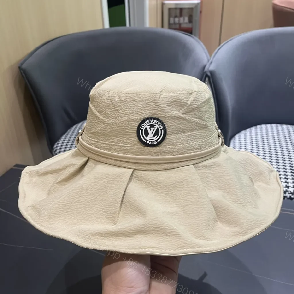 View 3 of Beige Textured Bucket Hat with Emblem, Everyday Luxury