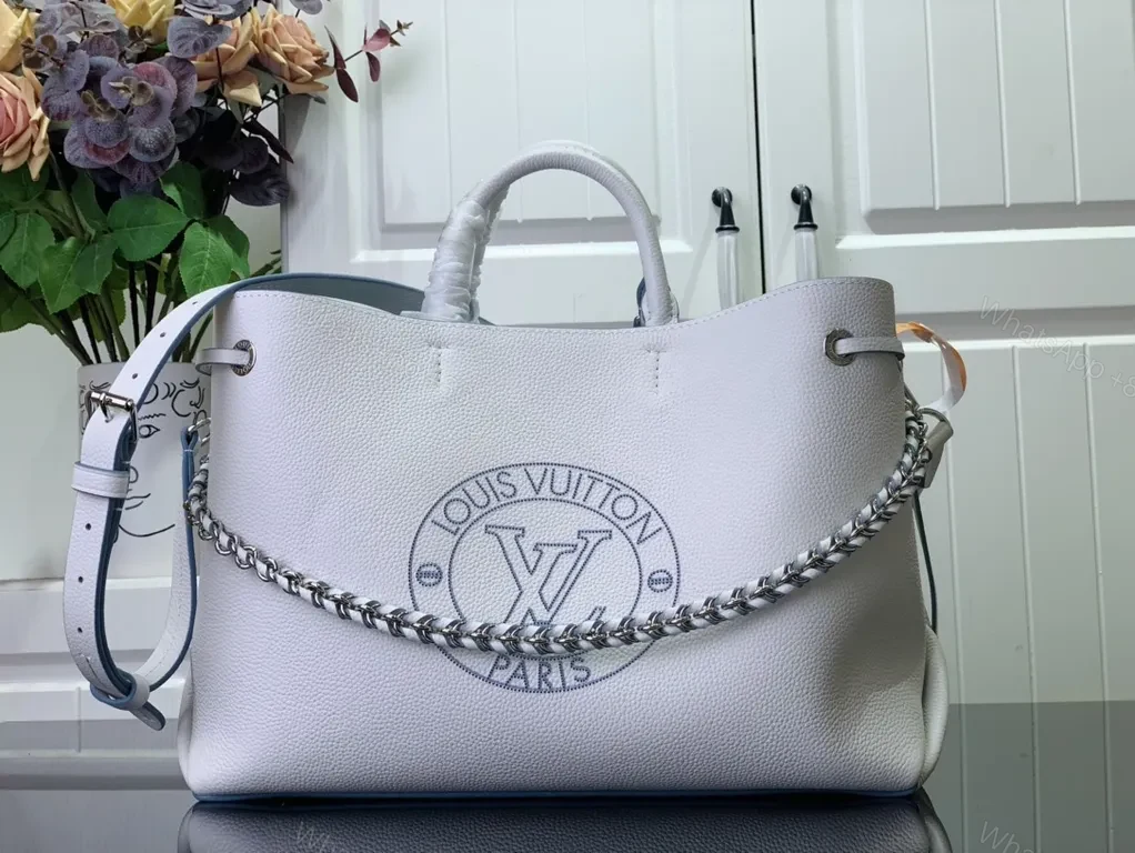 Pebbled Leather Tote: LV Emblem, Structured, Spacious Carrier — view 1