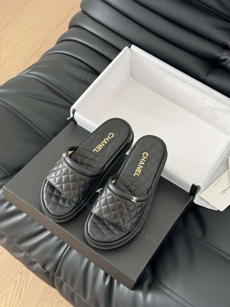 View 7 of Quilted Black Slip-Ons with Gold Logo - Luxe Comfort Shoes