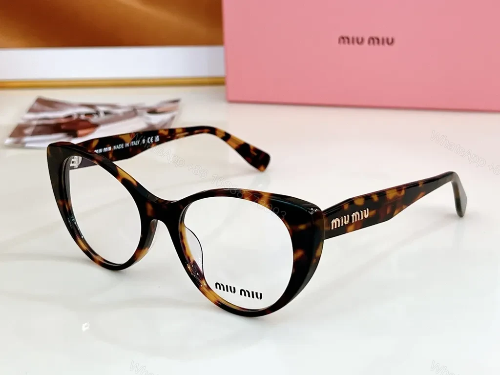View 8 of Miu Miu Black Cat-Eye Eyewear: Everyday Luxury