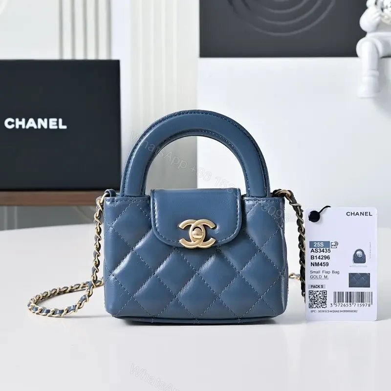 Compact Blue Quilted Satchel with Gold Clasp Bag — view 1