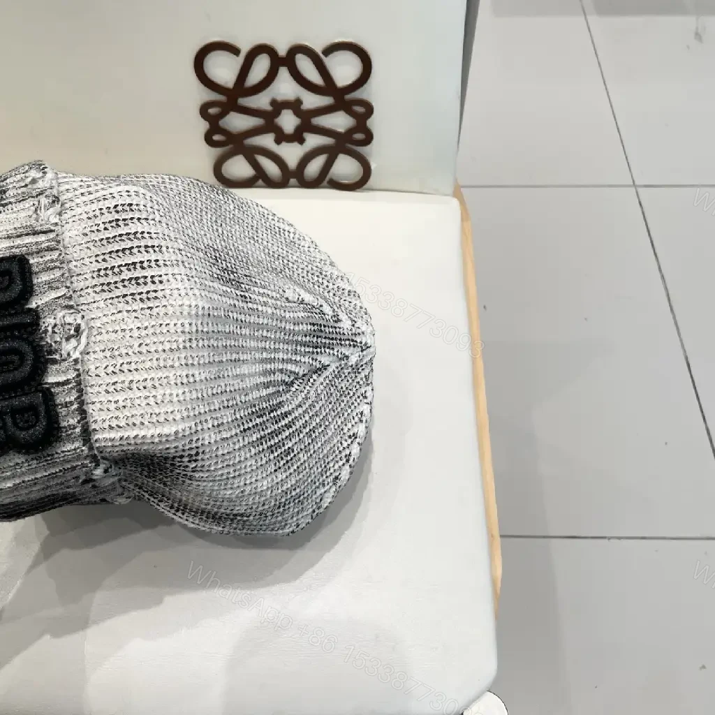 View 6 of Metallic Knit Beanie: Luxe Ribbed Warmth, Subtle Logo Interest