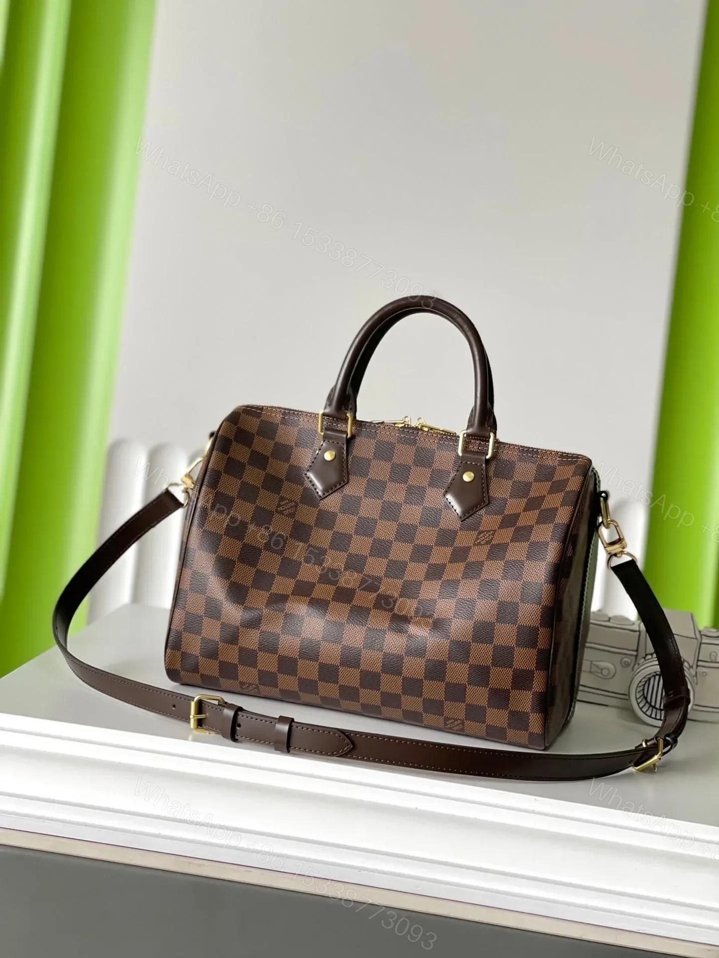 View 8 of LV SPEEDY BANDOLIÈRE 30 IN DARK BROWN DAMIER EBENE CANVAS GOLD LOCK