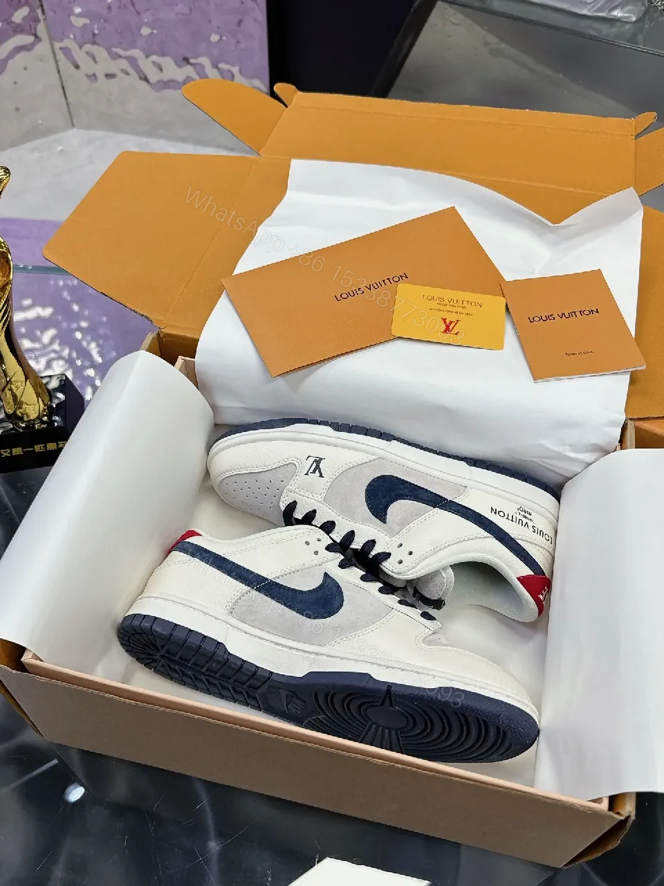 View 8 of White Leather Navy Accented Low-Top Sneakers: Premium Comfort, Subtle LV-Inspired Detailing