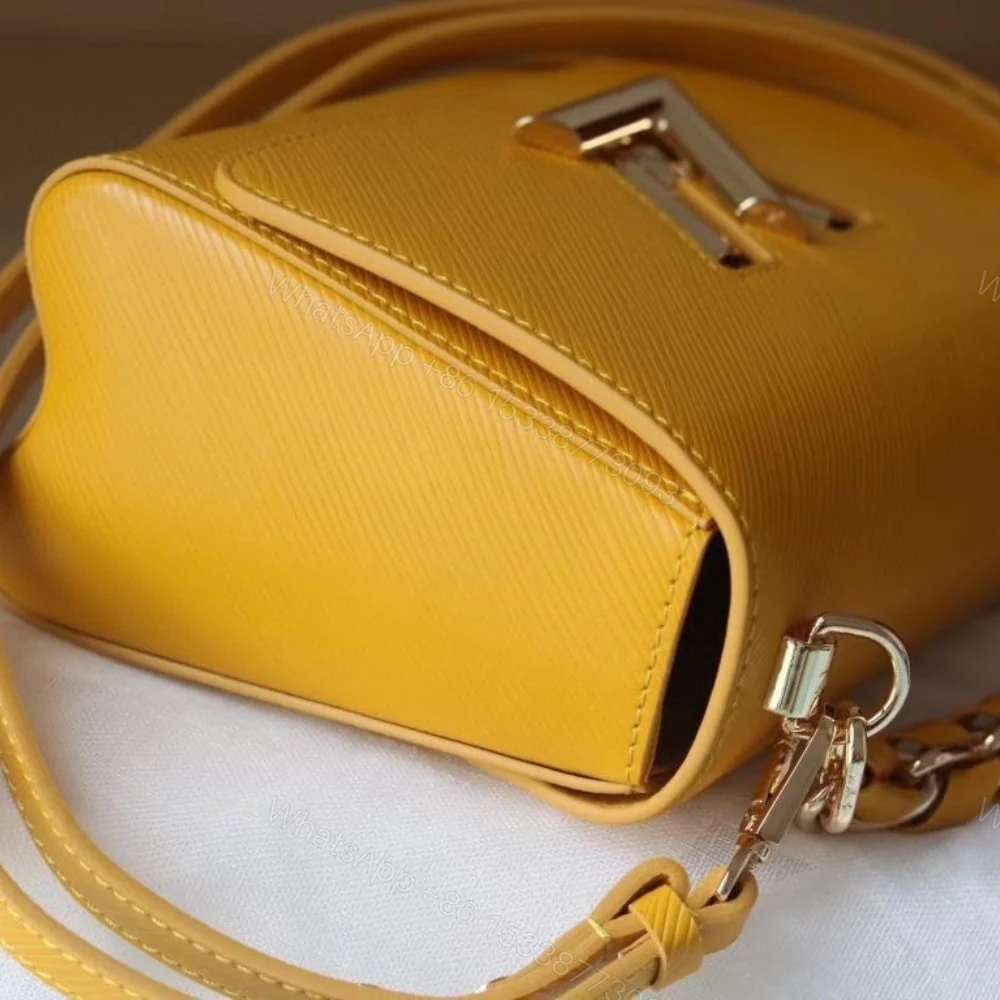 View 8 of Louis Vuitton LV Twist MM Handbag Sunflower Yellow 23Cm