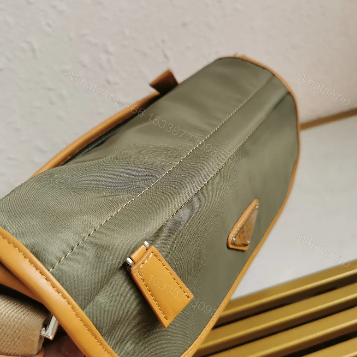 View 7 of MESSENGER BAG 20 IN KHAKI GREEN RE-NYLON AND BROWN CALFSKIN TRIM