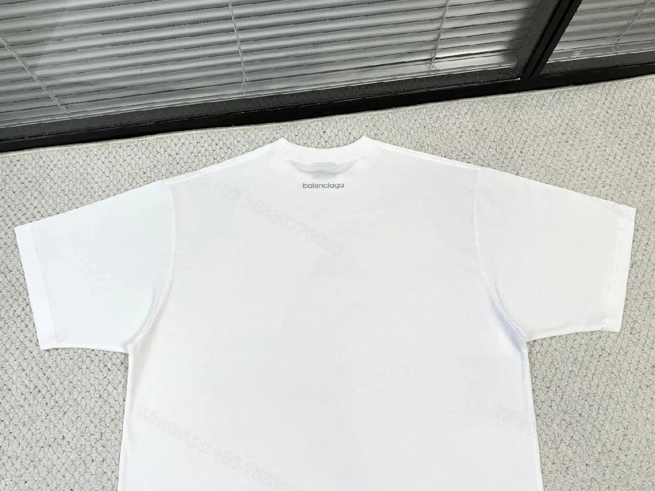 View 4 of White Cotton Minimalist T-Shirt with Balenciaga Logo