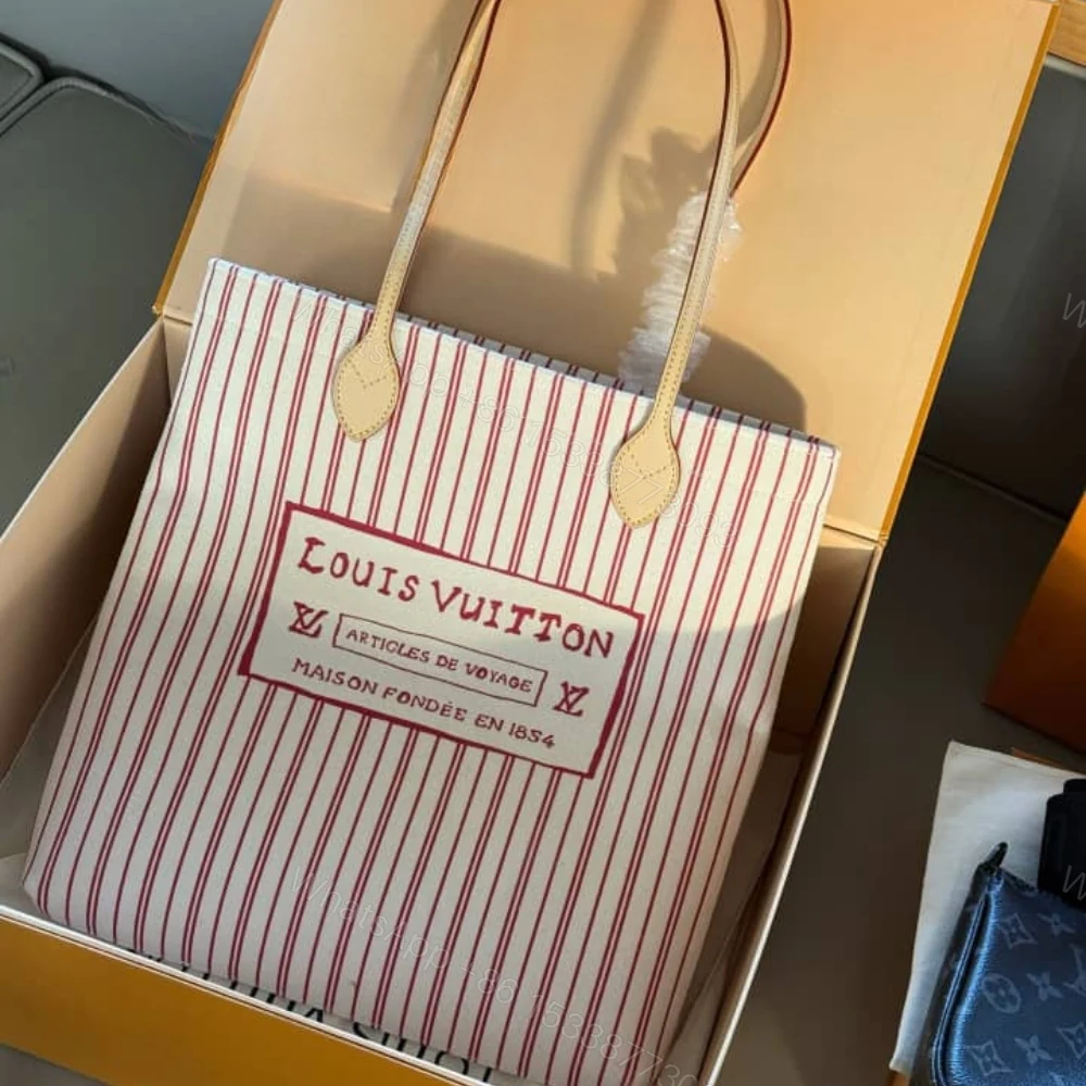 View 3 of LOUIS VUITTON CARRY IT BEIGE 37CM M15121