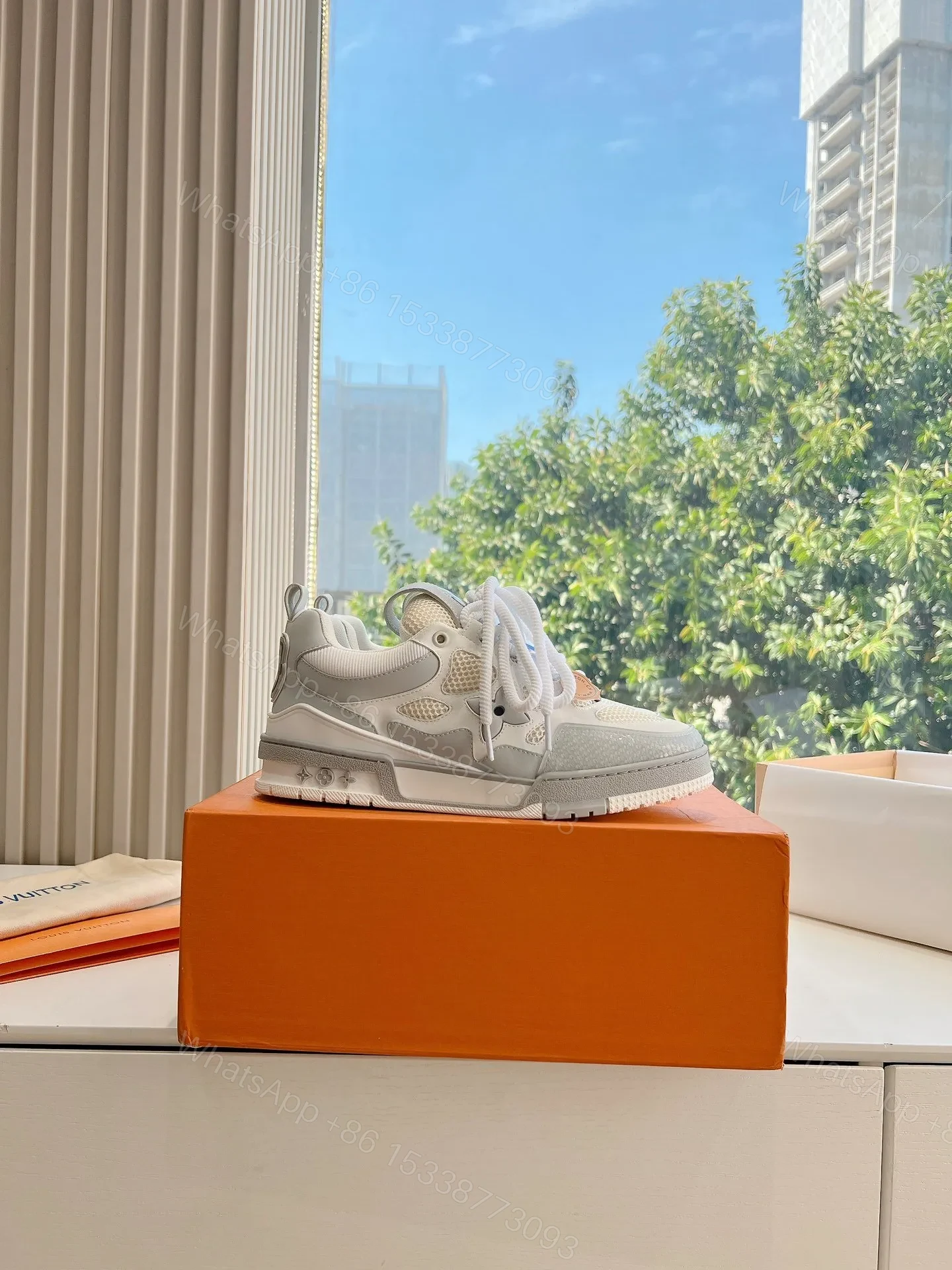 View 2 of LV Women White Mesh And Leather Sneakers