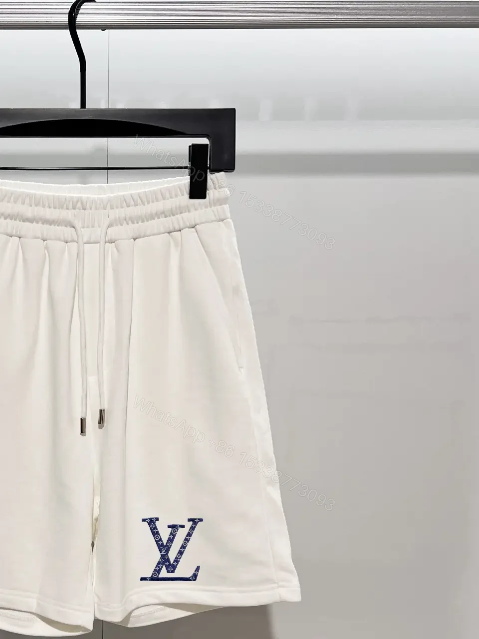 View 8 of Minimalist Luxe Sweatshorts: Premium Relaxed Fit, LV Accent Shorts