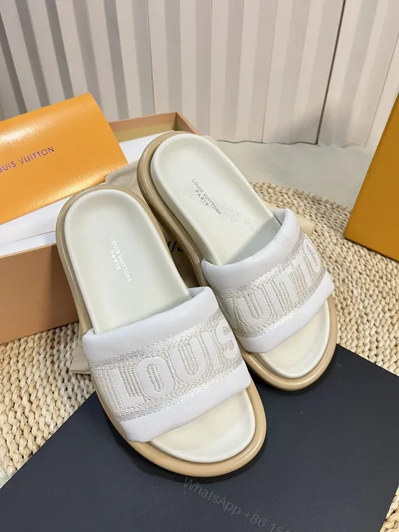 View 7 of Louis Vuitton Luxe Textured Slides with Logo Embellishment