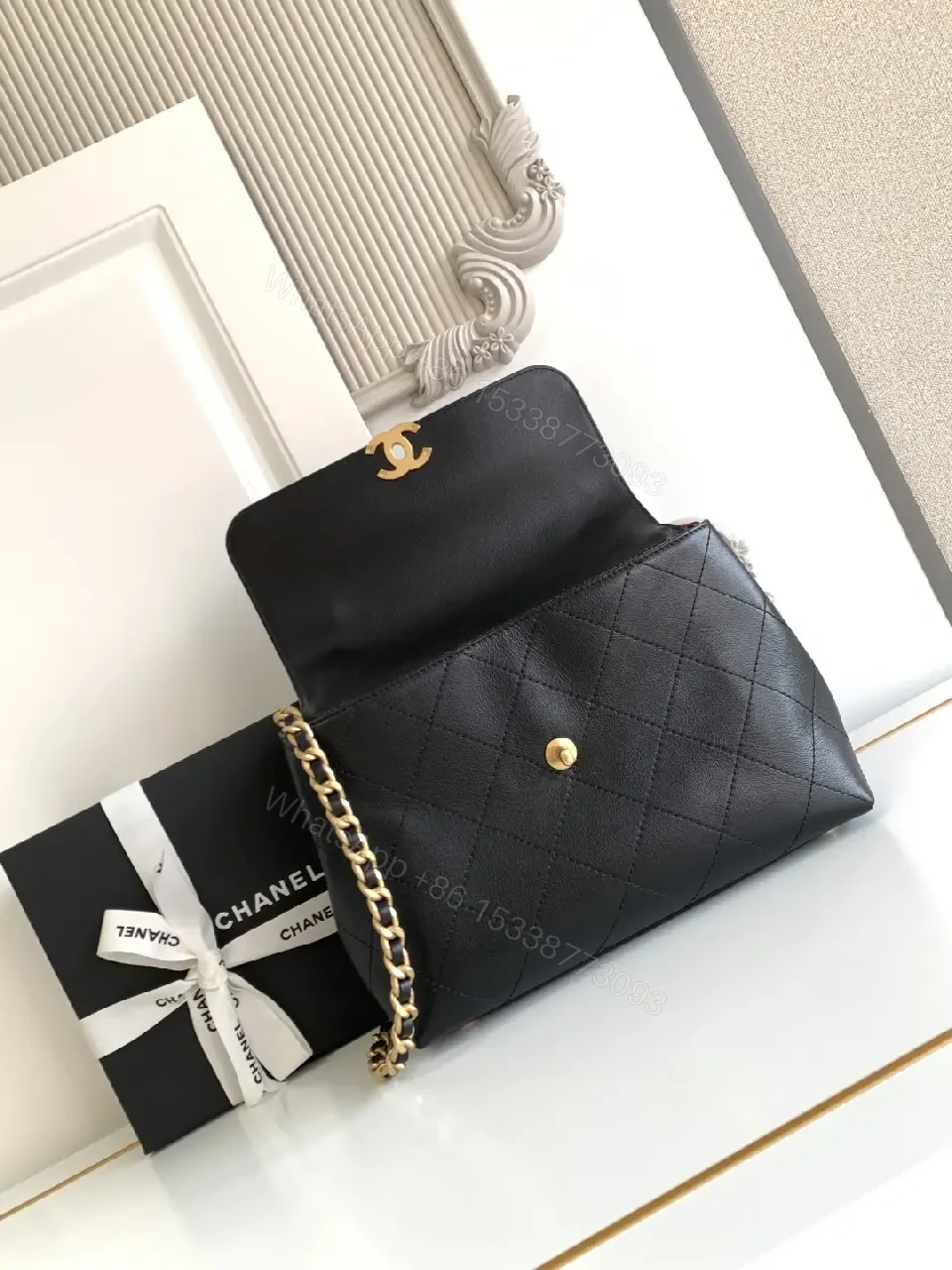 View 5 of Compact Quilted Black Leather Flap Bag with Chain Strap