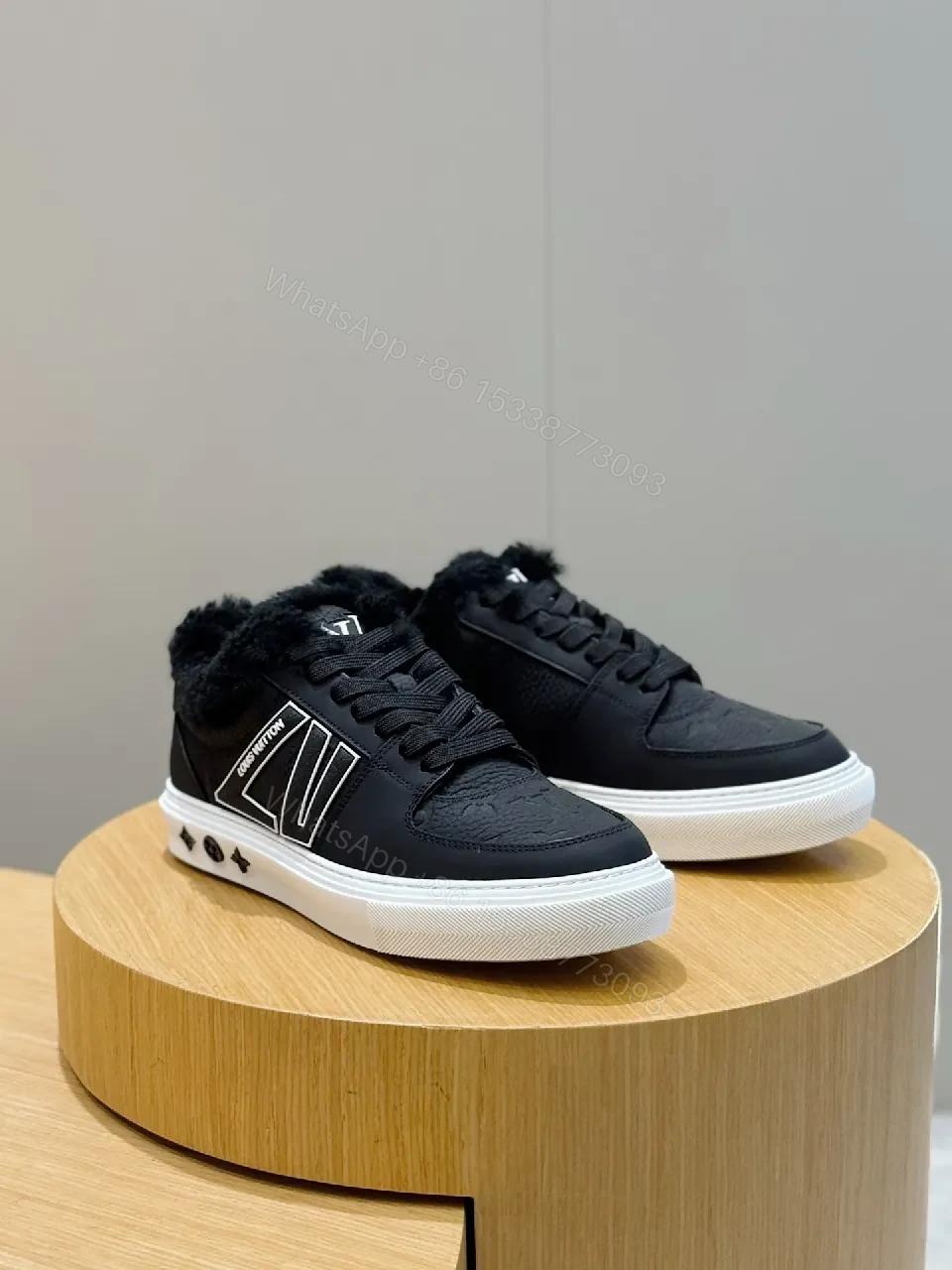 View 3 of Fur-Lined Black Leather High-Top Sneakers: Luxury Comfort