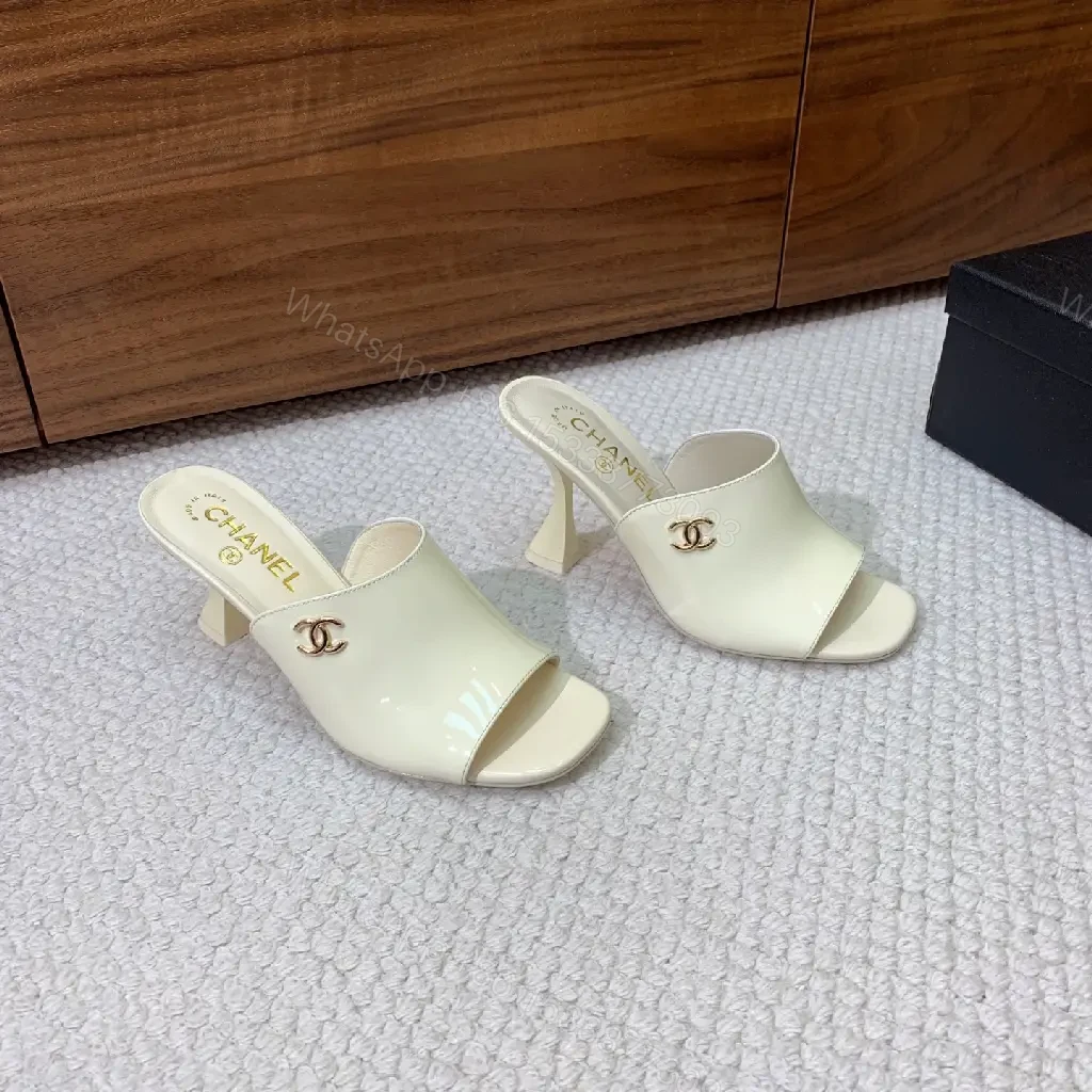 View 7 of Cream Leather Slide Sandals, Pearl White, Chanel Logo, Midsize Heel Mules