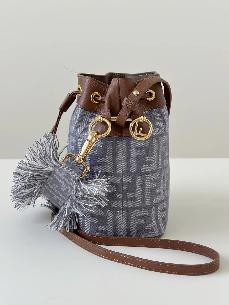 View 2 of Chic Canvas Bucket Bag with Leather Trim & Fringe Detail