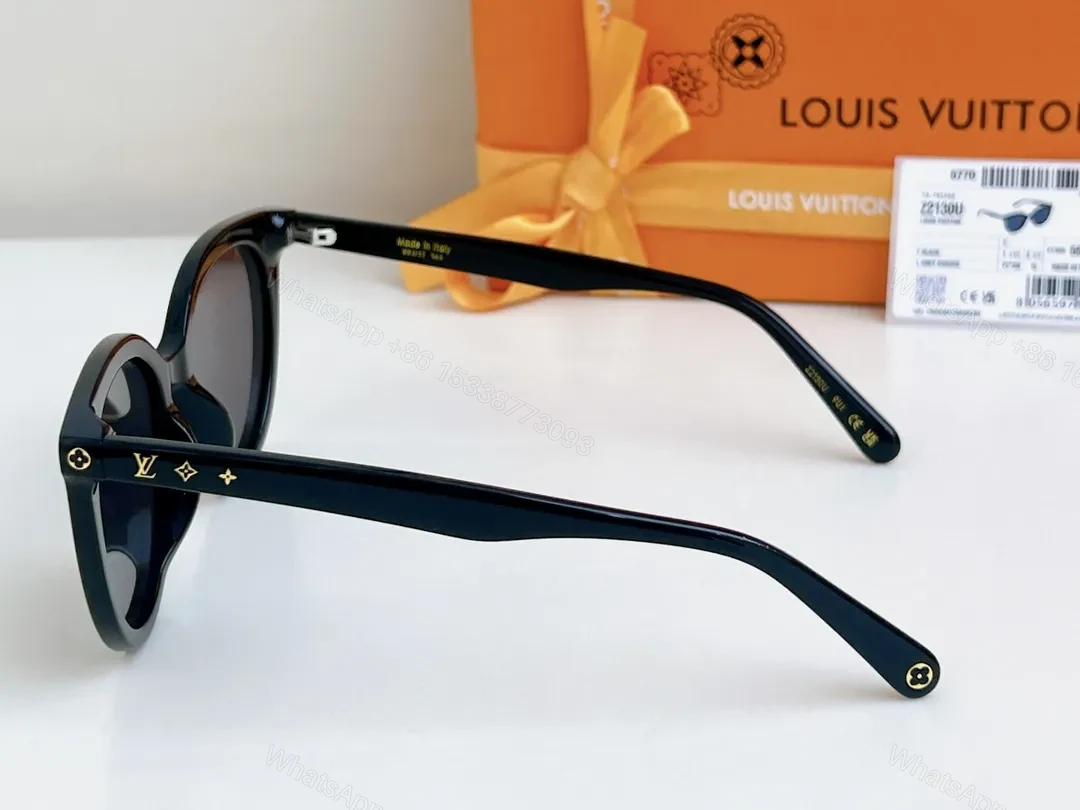 View 8 of Sleek Black Round-Frame Sunglasses with LV Accents