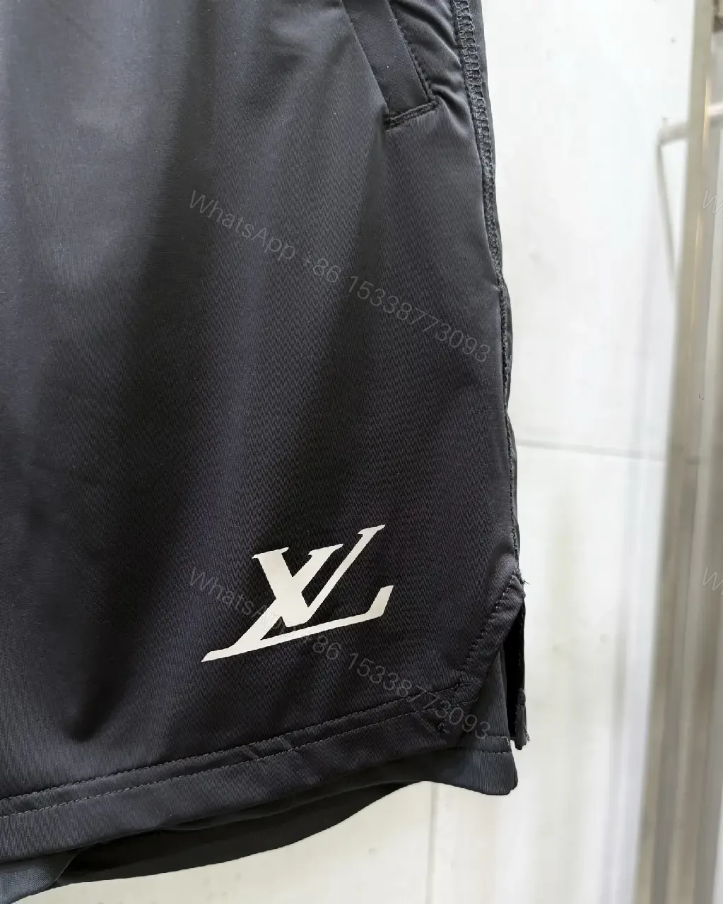 View 7 of Matte Black Quick-Dry Shorts with Subtle LV Detailing