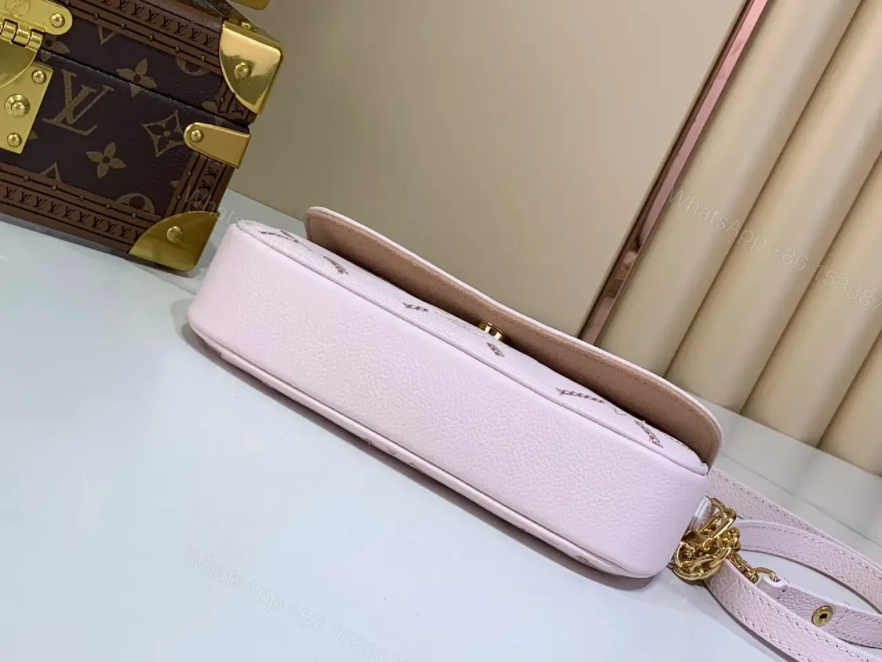 View 8 of Light Pink Pebbled Leather Shoulder Bag with LV Monogram Pattern