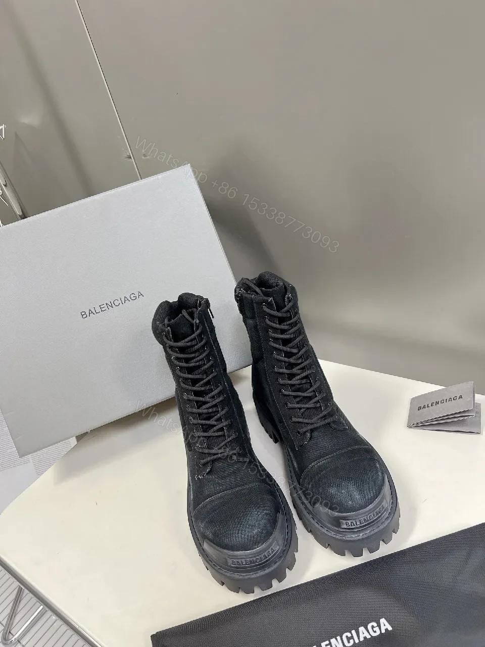 View 4 of Bold Black Combat Boots with Rugged Texture
