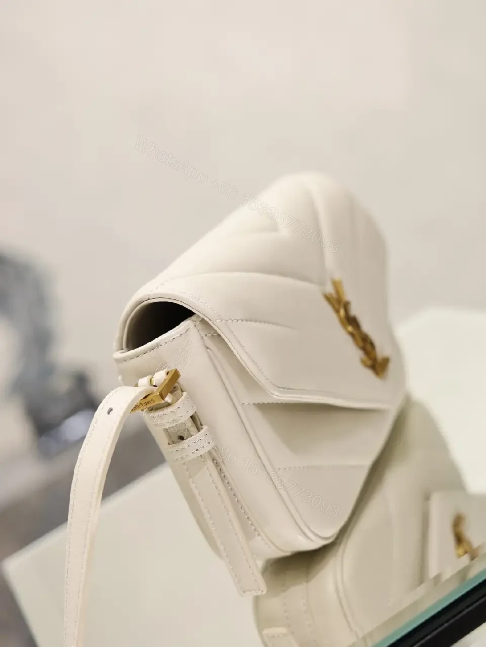 View 7 of Off-White Cream Leather Mini Crossbody Bag with Chevron Front Feature
