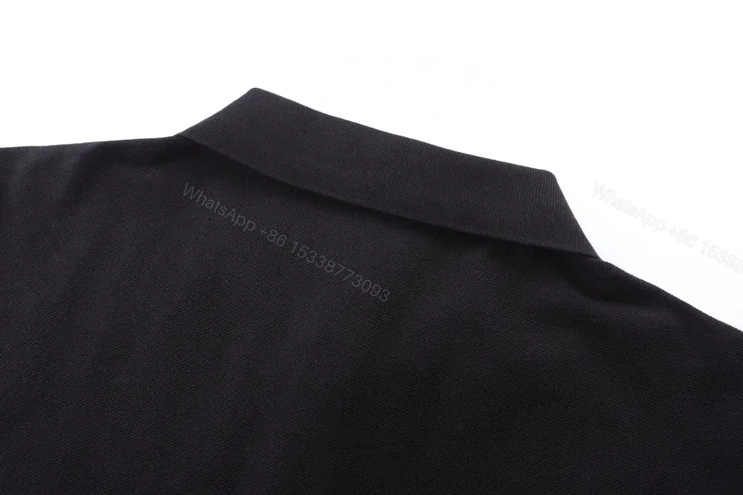View 5 of Classic Black Polo with Subtle Crest, Premium Cotton-Blend, Menswear