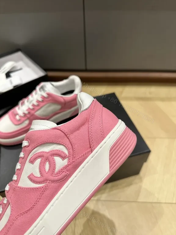 View 3 of Chic Pink & White Coach-Style Sneakers: Luxury Comfort