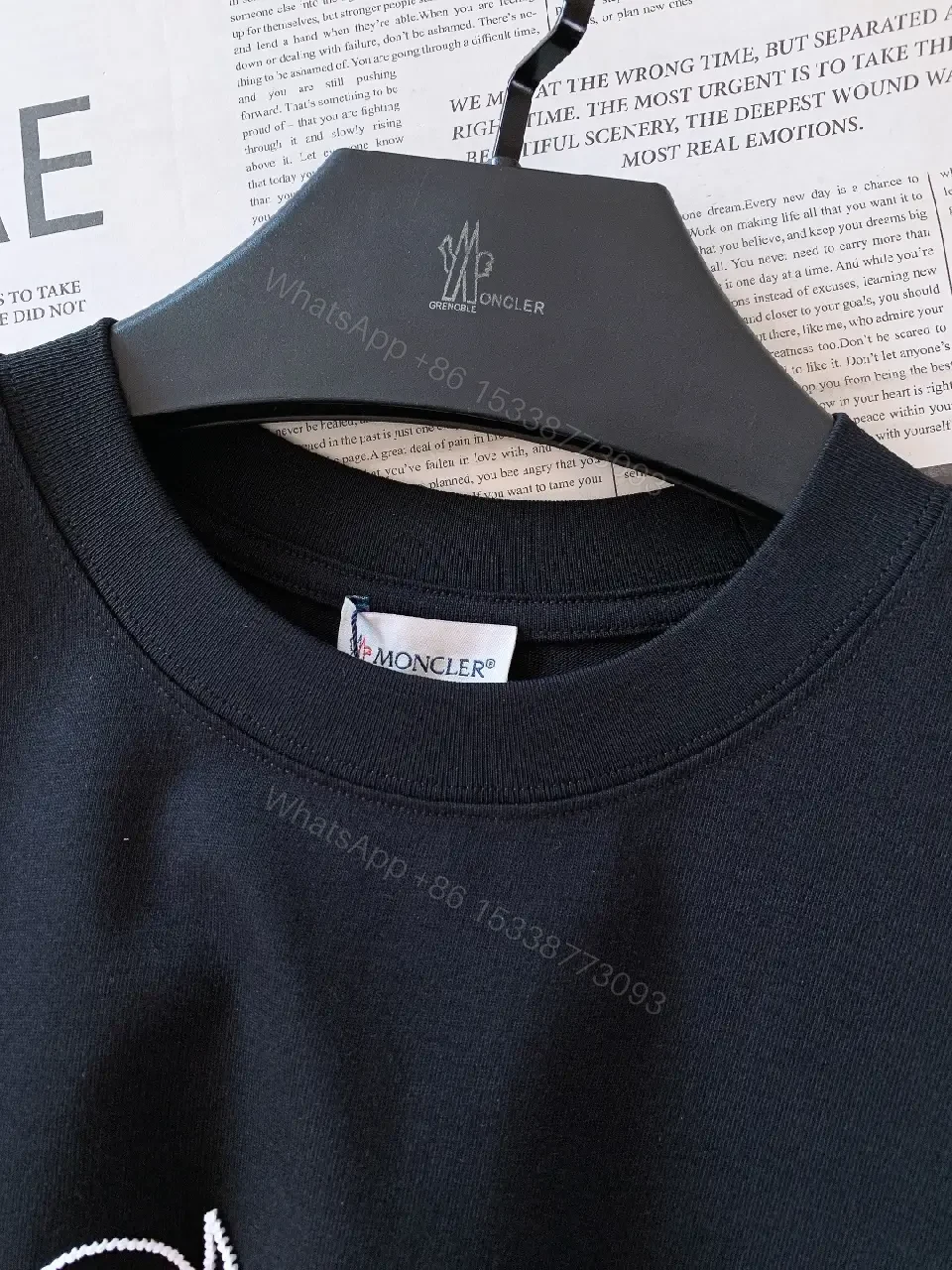 View 3 of Premium Logo Tee: Black Cotton Crewneck, Modern Luxe, Unisex Product Type