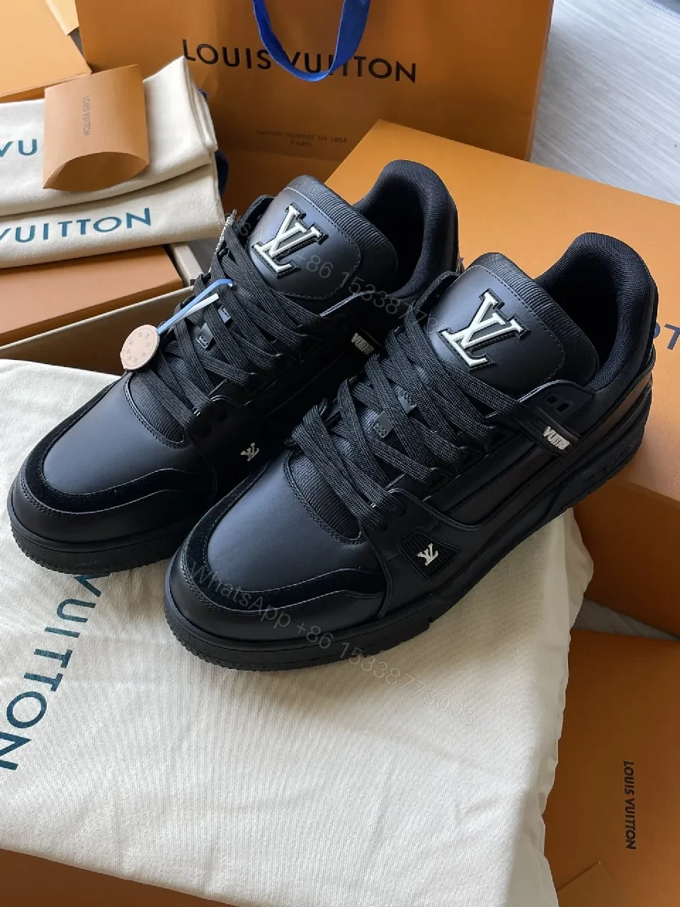 Black Leather High‐Top Sneakers with LV Embellishments — view 1