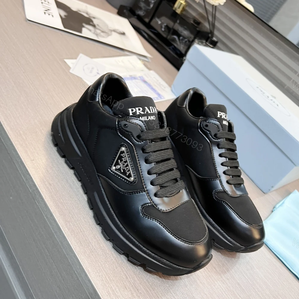 View 2 of Prada Prax 01 Re Nylon And Brushed Leather Sneaker Black 2EE369 3LF5 F0632 F G000