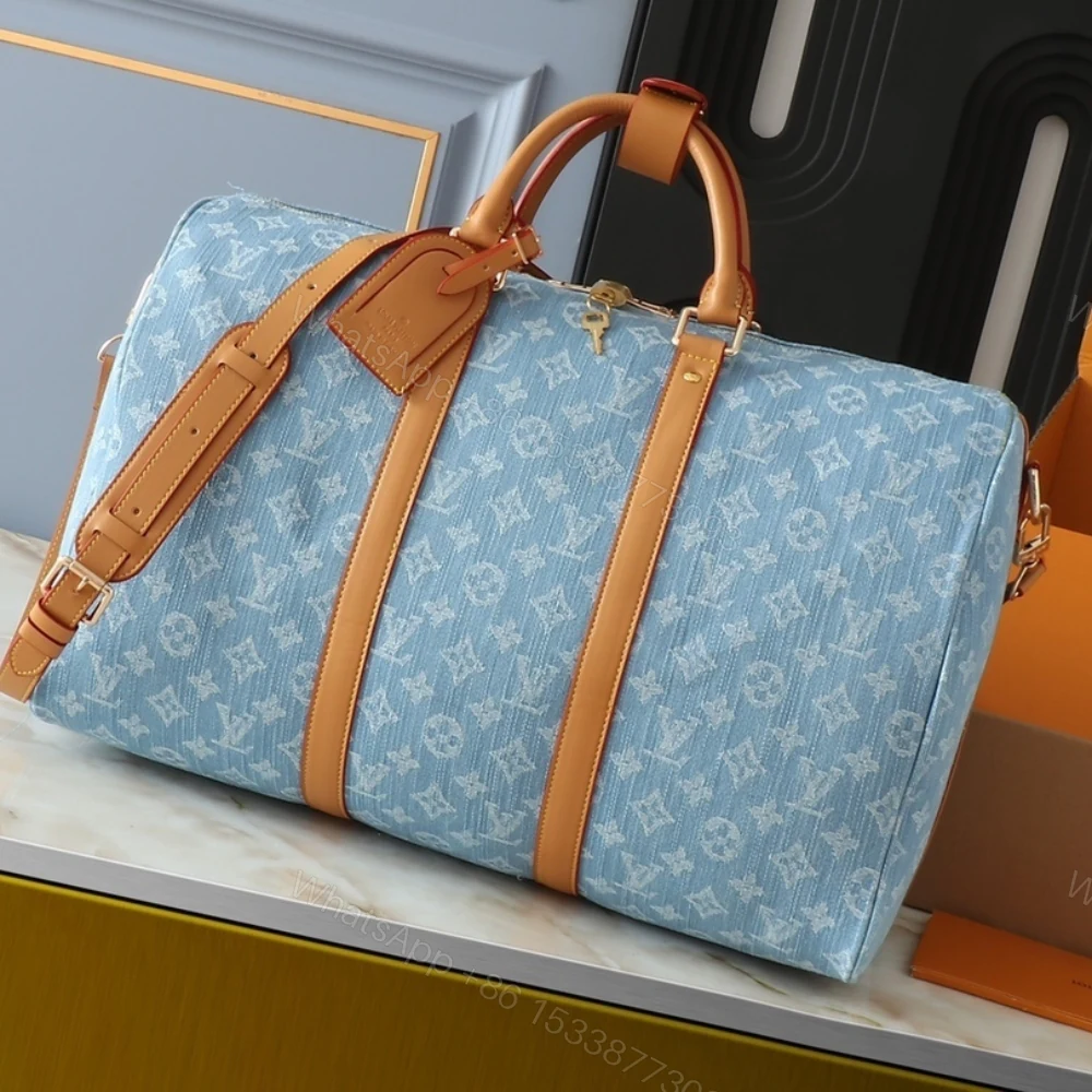 View 2 of Louis Vuitton Keepall Bandoulièrè 45 Bag Sky Blue Denim 45Cm M25334