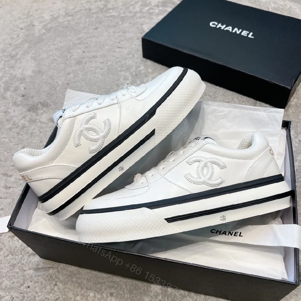 View 2 of White Leather High-Top Sneakers with Subtle Hardware Details