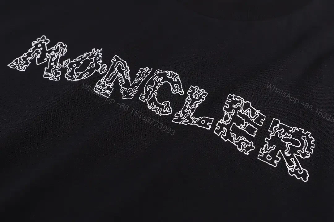 View 5 of Minimalist Black Tee, Premium Cotton, Modern Fit, Logo Detail, T-Shirt