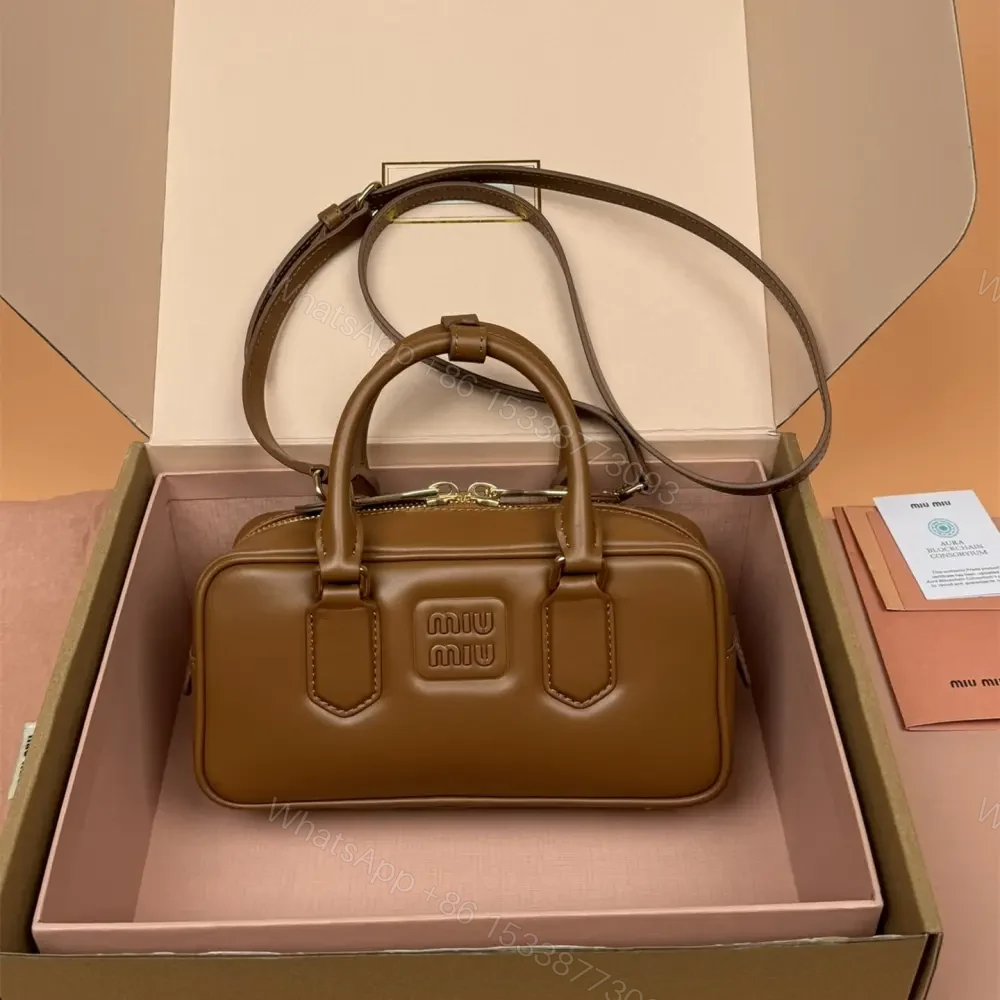 View 9 of 高仿miumiu*Arcadie系列5BB142小牛皮斜挎包干邑色免檢版