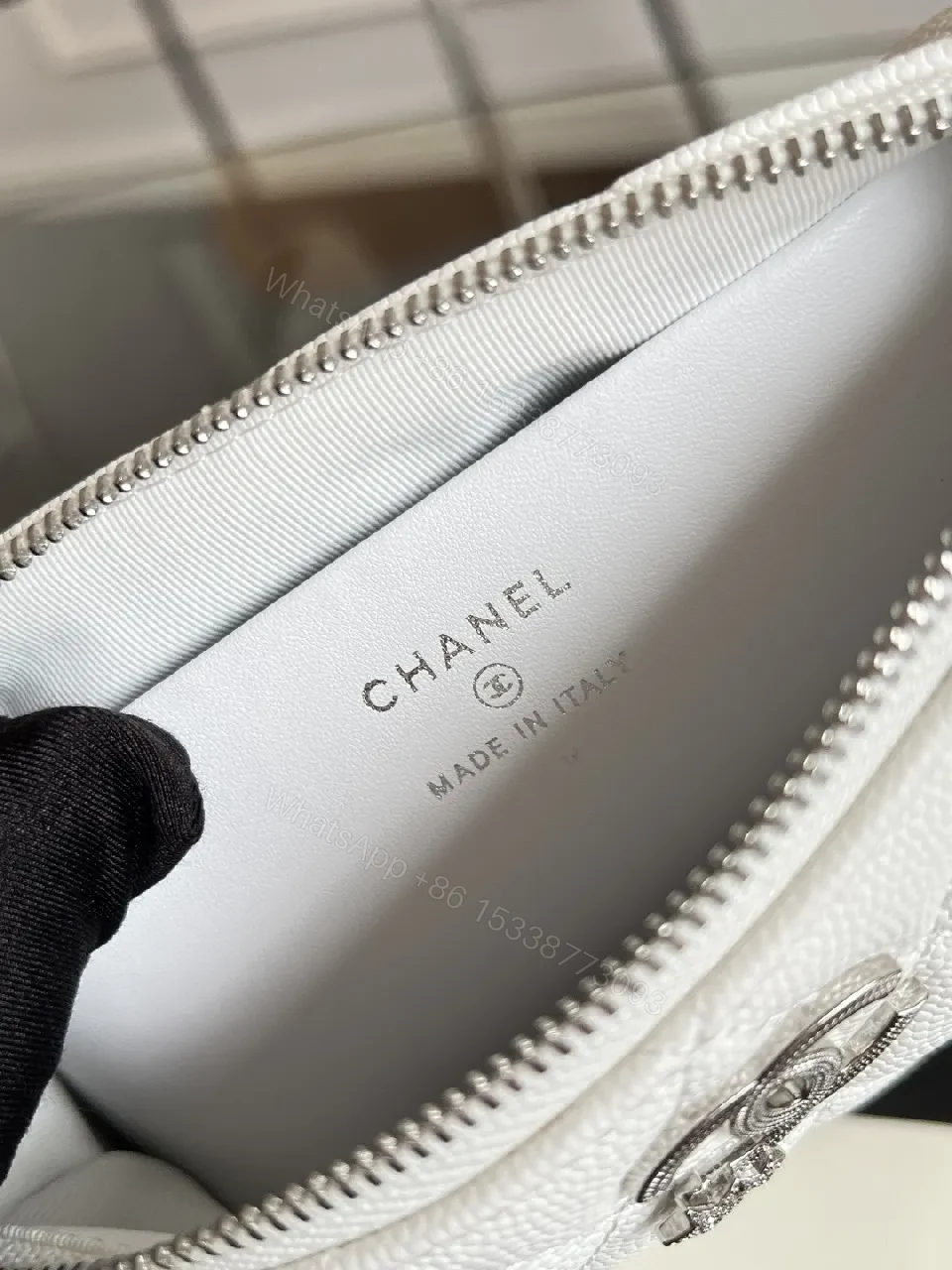 View 2 of Quilted White Mini Bag with Silver Chain - Luxe Compact Style