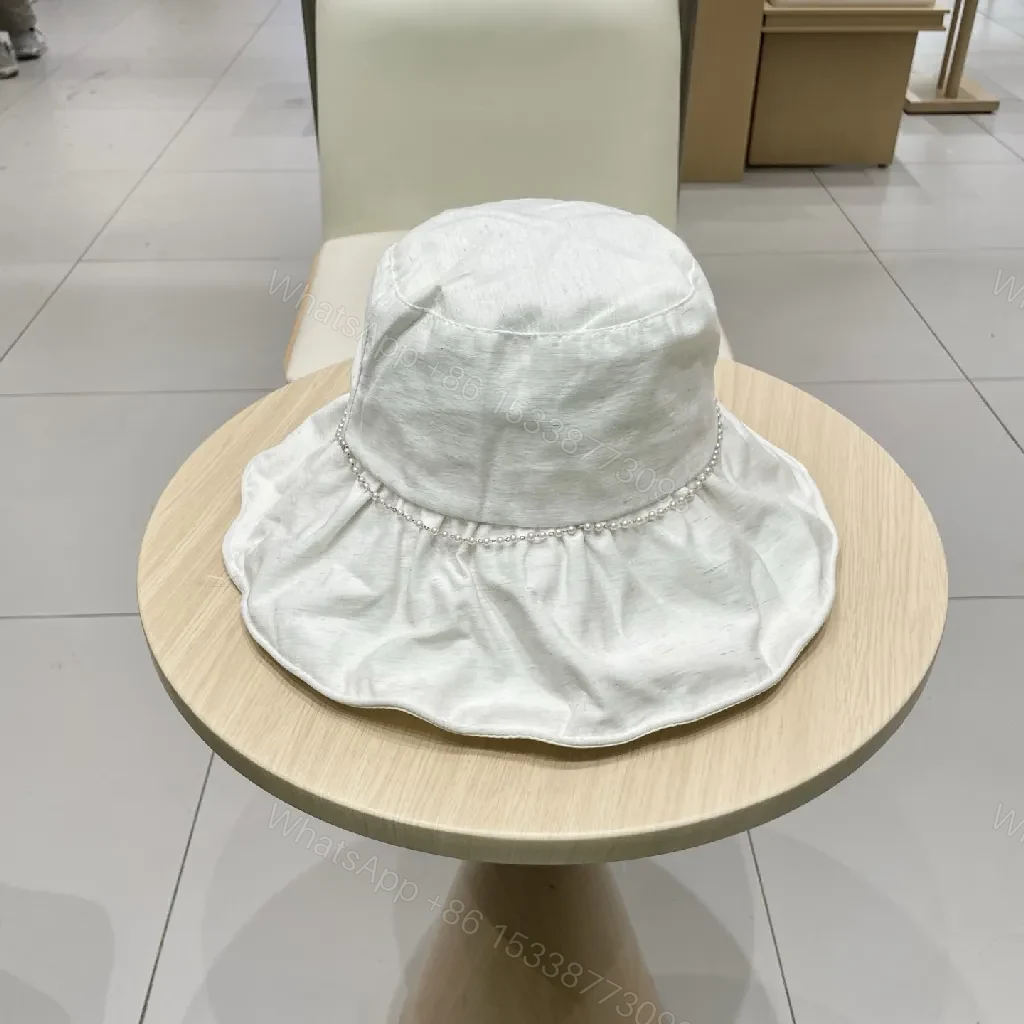 View 5 of Ivory Pearl-Trim Luxe Bucket Hat - Lightweight Style + Comfort