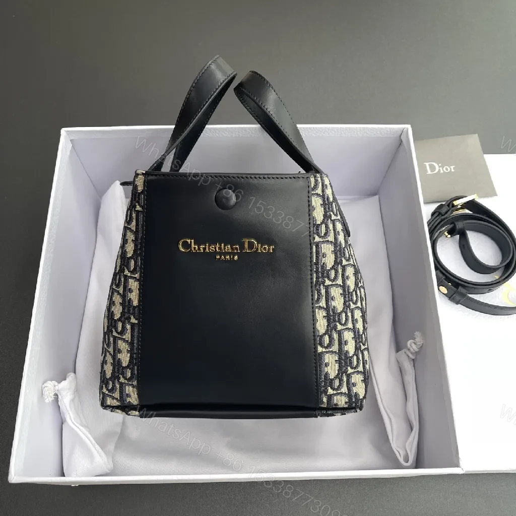 Black Leather Mini Crossbody: Signature Monogram Compact Bag — view 1