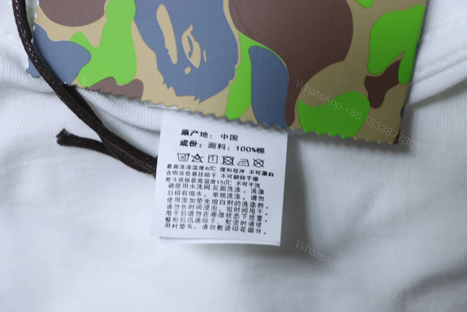 View 9 of BAPE check-pattern ape head letter print short-sleeved T-shirt in white