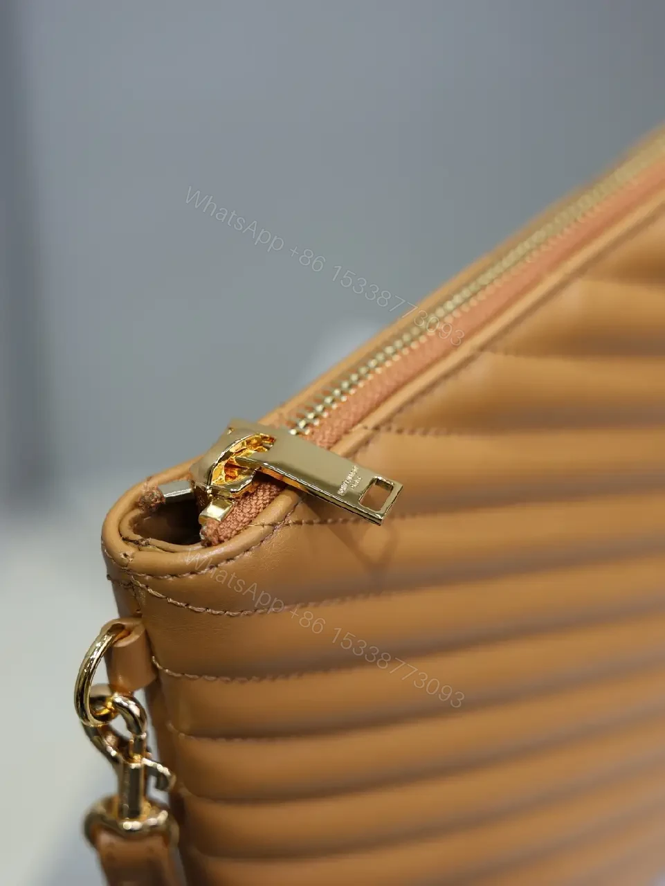 View 2 of Quilted Leather Chevron Clutch with Wrist Strap - Day-to-Night Carry