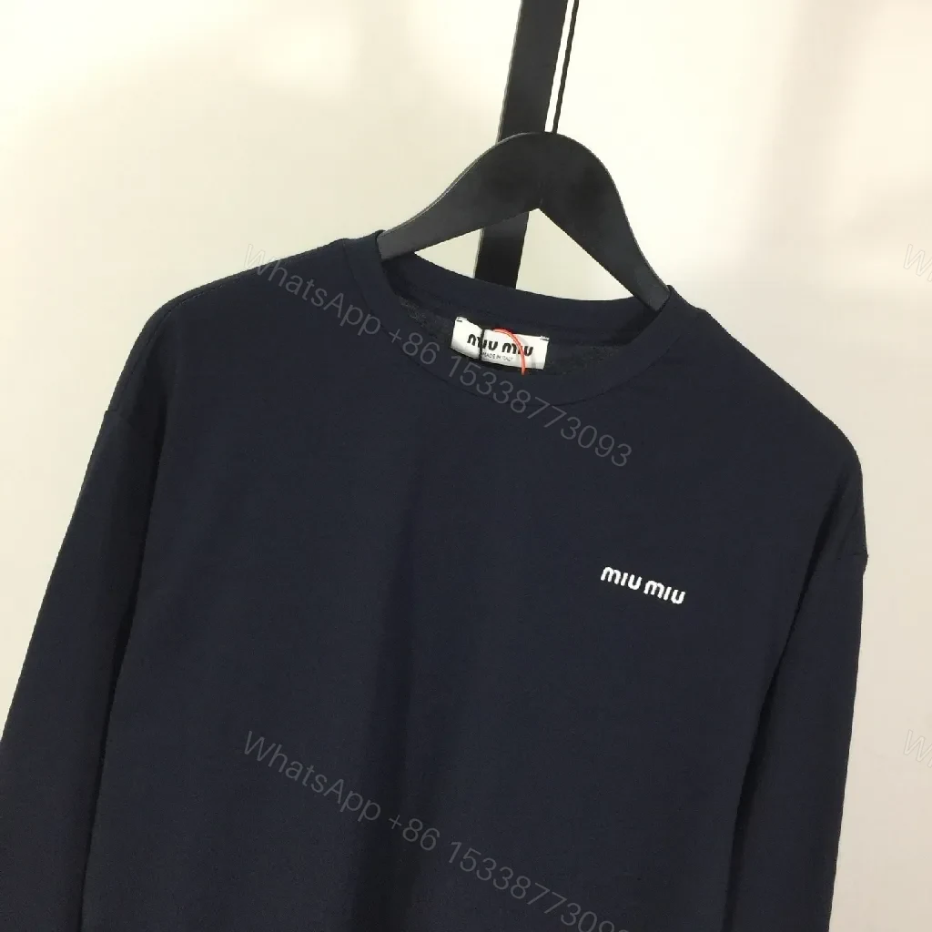 View 7 of Minimalist Navy Cotton Crewneck Sweatshirt with Subtle Logo
