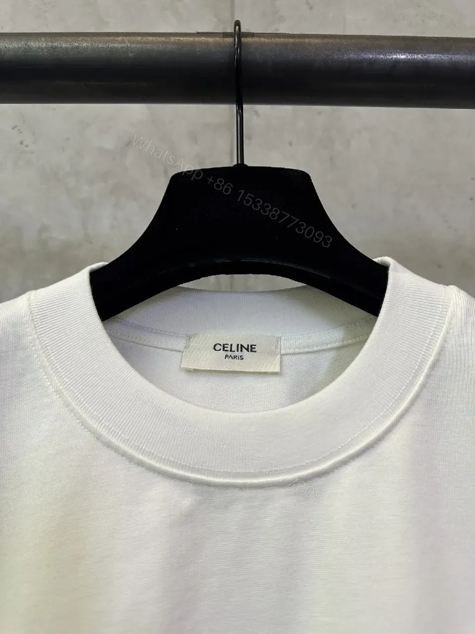View 2 of Oversized White Cotton Tee with Bold CELINE Arch Graphic