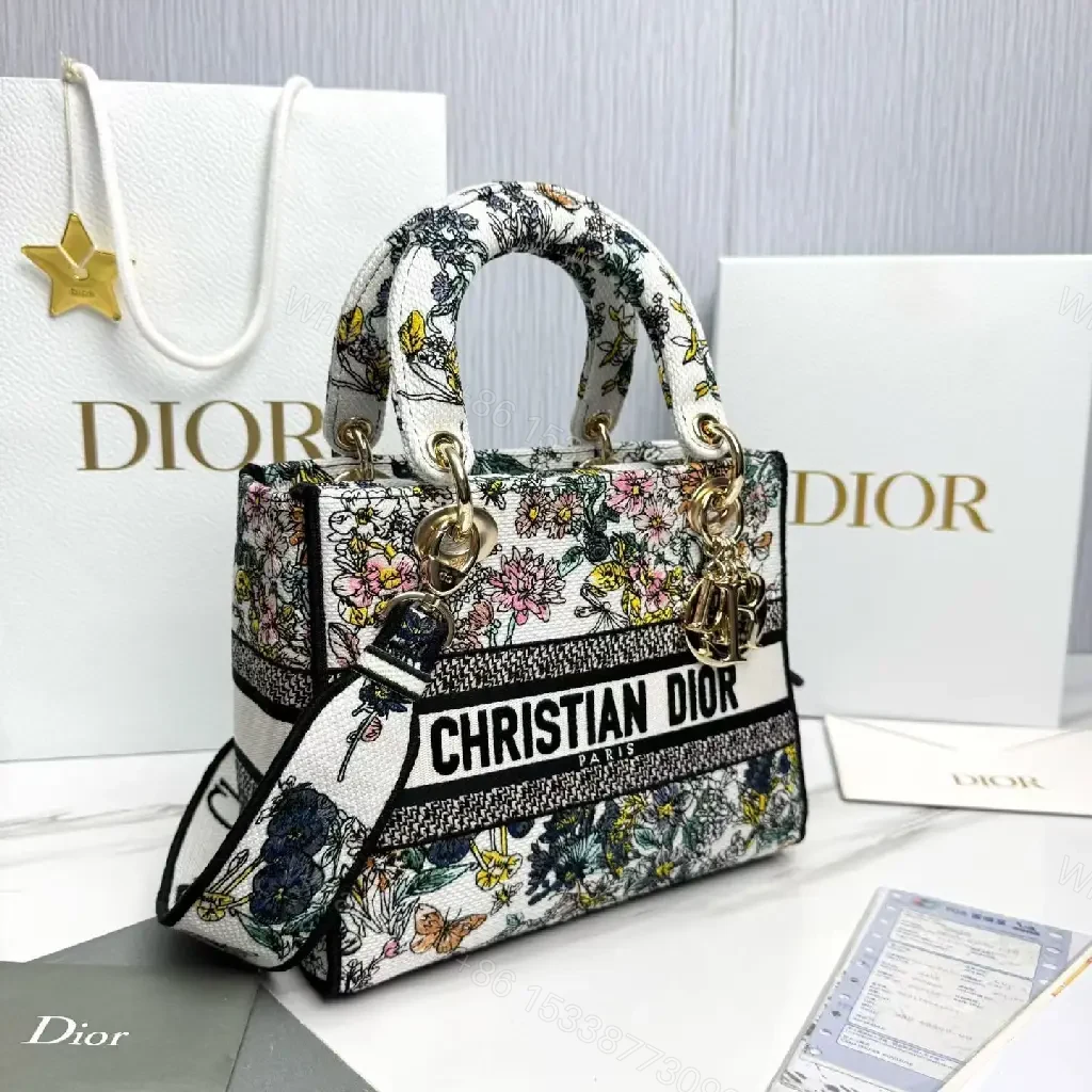 View 9 of Floral Canvas Luxe Bag with Logo Detailing Handbag