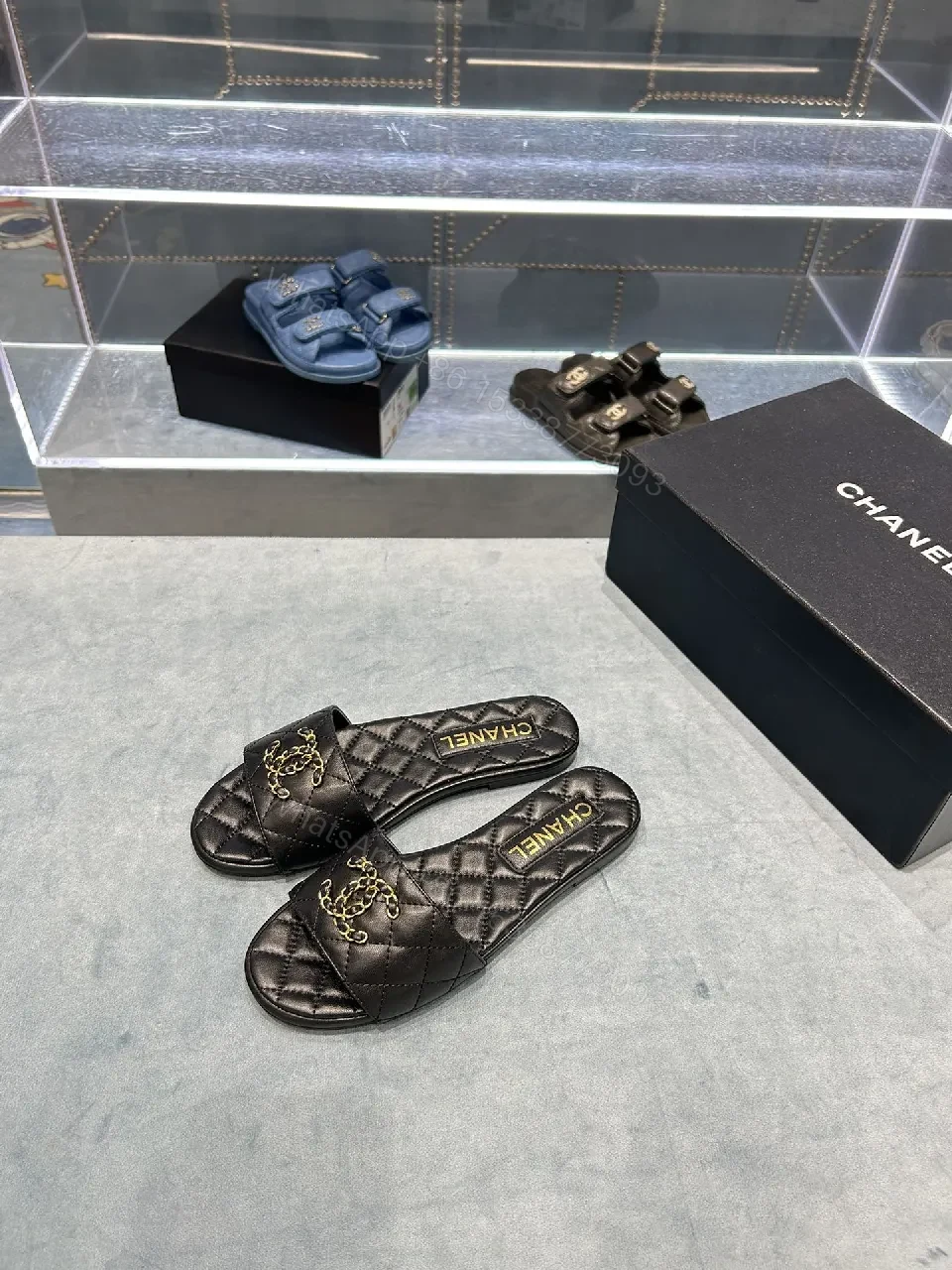 View 4 of Quilted Black Slides with Gold Emblem – Lux Slip-ons