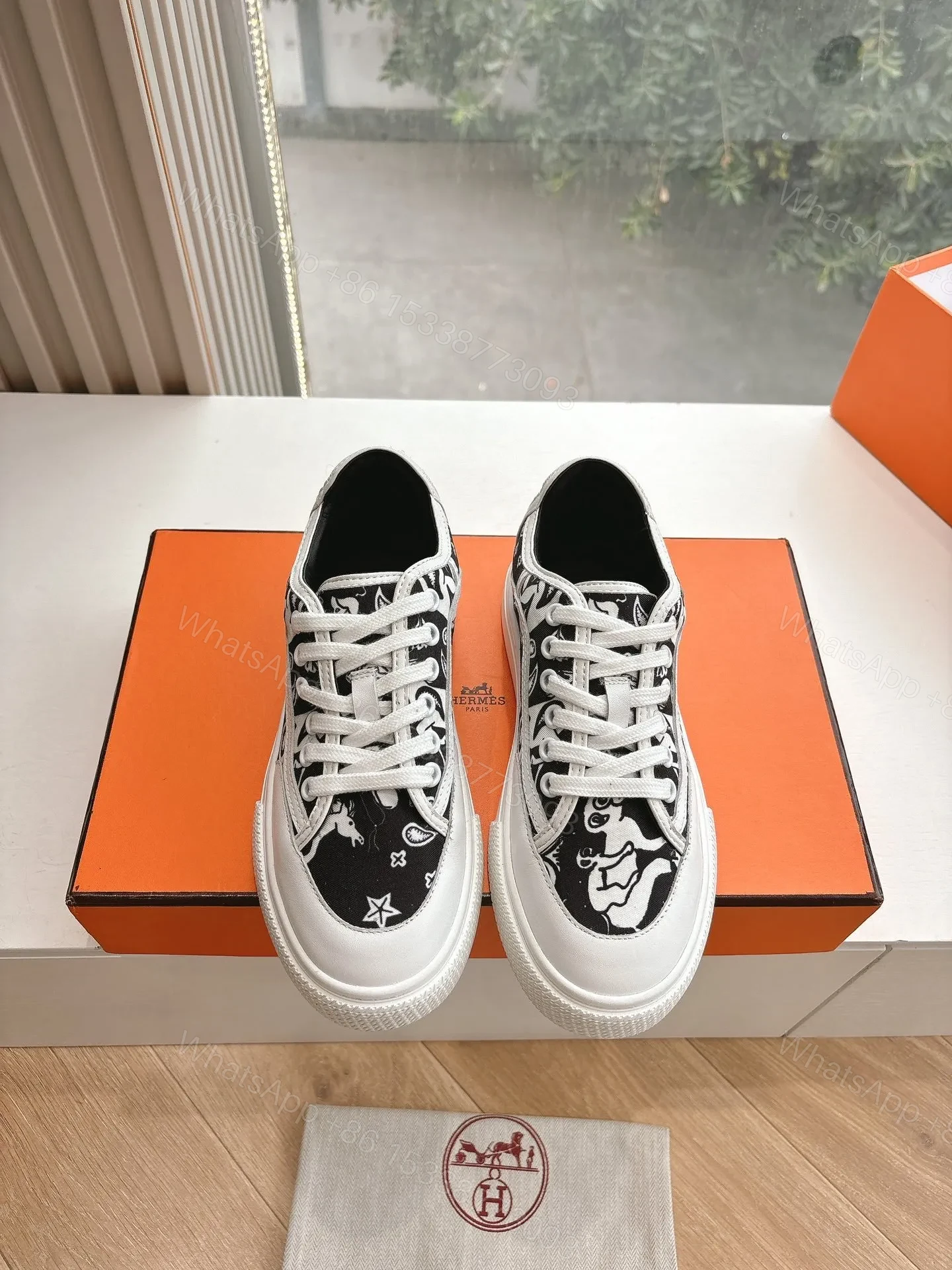 View 5 of Hermes Women Black White Canvas Sneakers