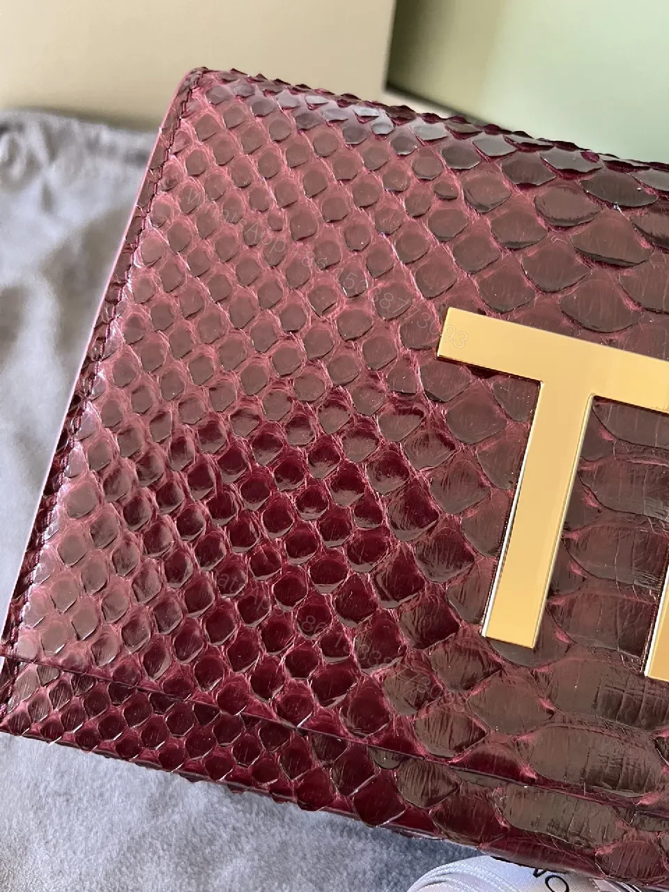 View 6 of Burgundy Python Textured Clutch with TF Gold Hardware