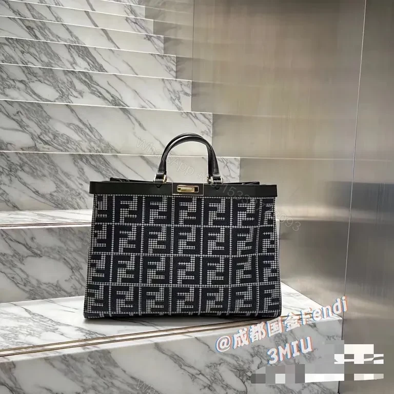 View 2 of Bold Fendi Monogram Structured Handbag: Versatile Luxury