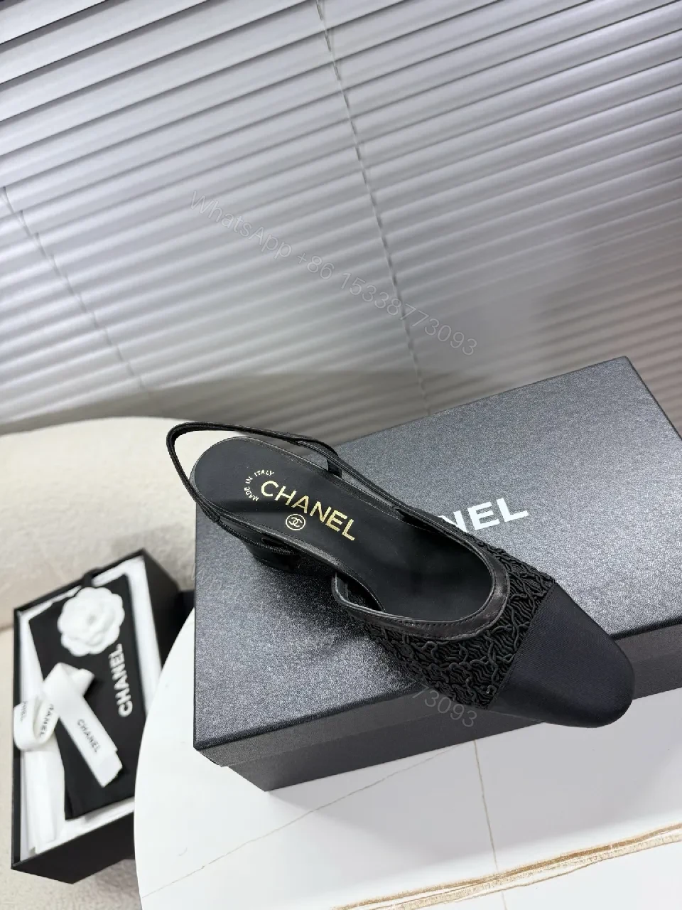 View 3 of Chic Black Mesh Slingback: Textured Luxury Slip-Ons