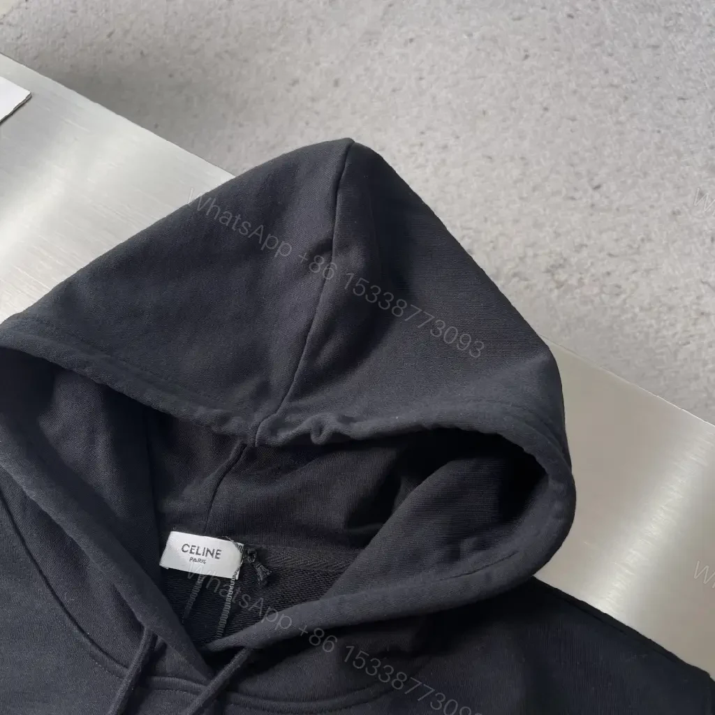 View 7 of Minimalist Logo Hoodie: Black Knit, Relaxed Streetwear Comfort