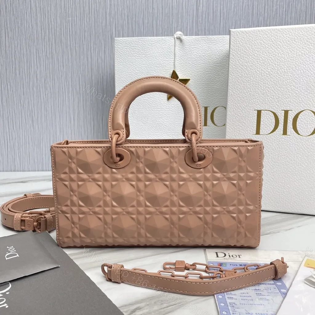 View 2 of Textured Pink Quilted Mini Bag: Elegant Everyday Luxury