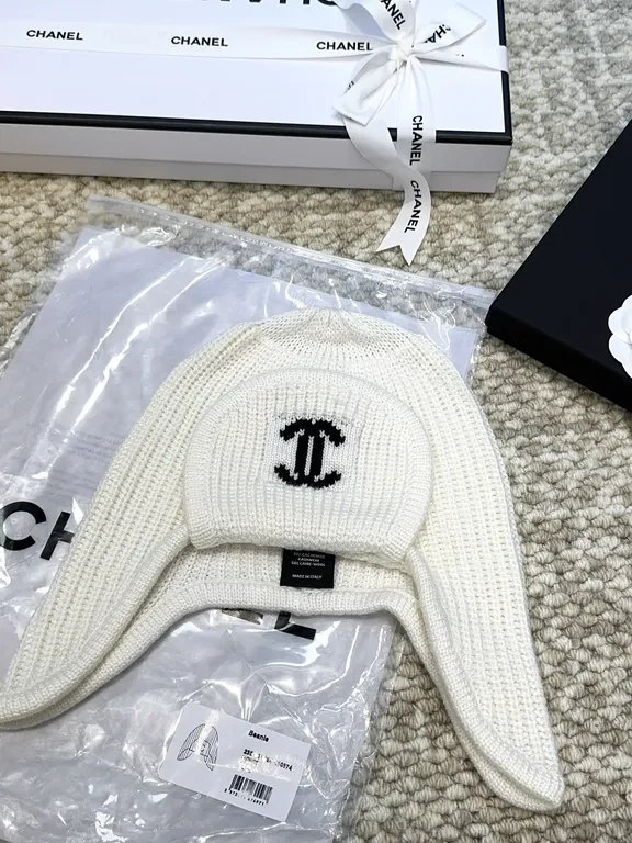 View 7 of Ivory Merino Knit Ear Warmer Hat - Luxe Logo Emblem
