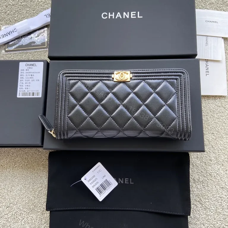 Black Quilted Leather Wallet with Gold Chanel Hardware, Slim & Elegant — view 1